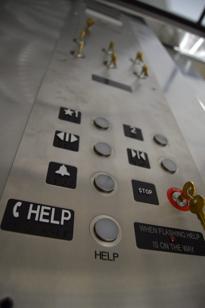 Emergency elevator panel phones
