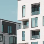 white, high rise apartment - elevator phone service for property managers
