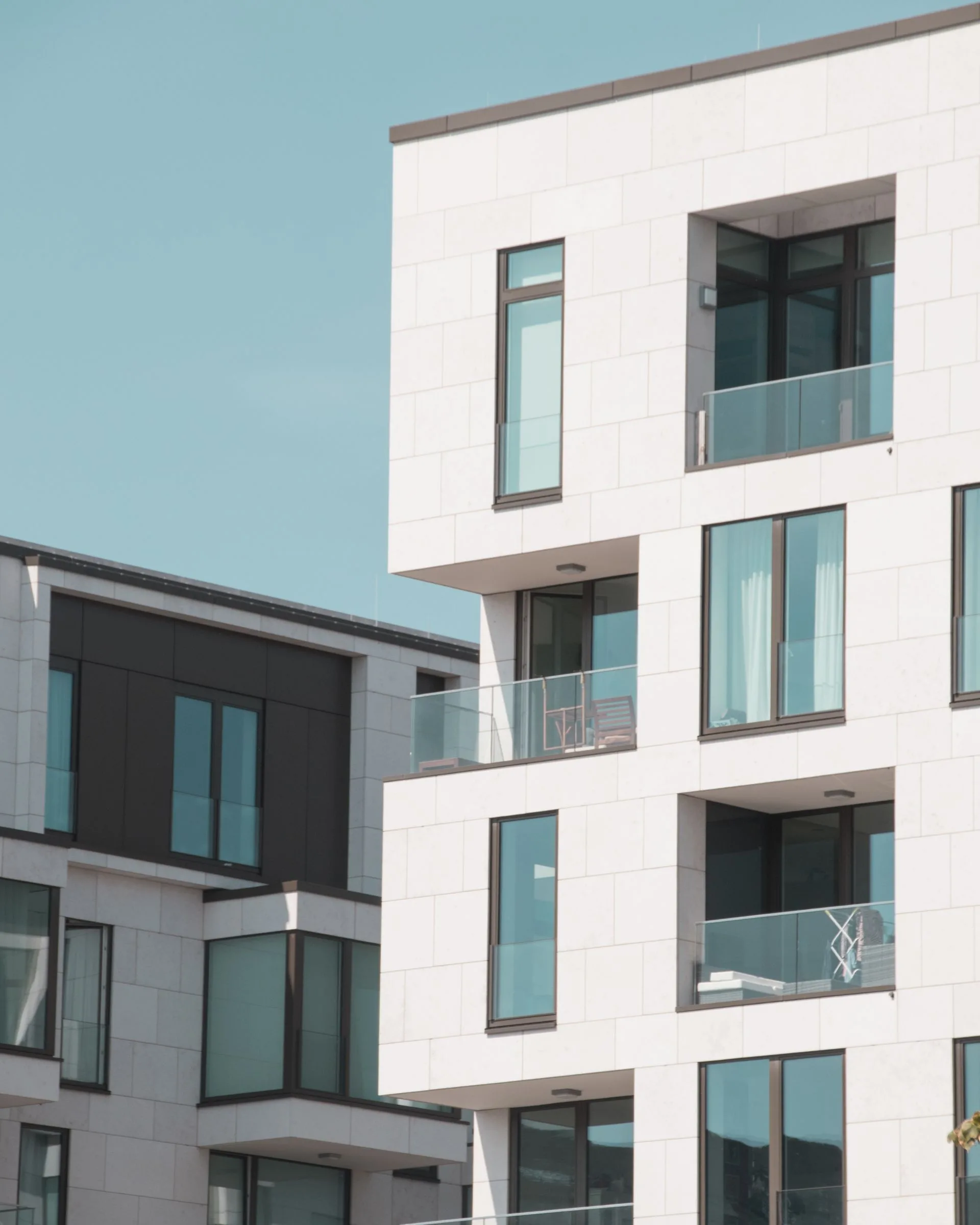 white, high rise apartment - elevator phone service for property managers